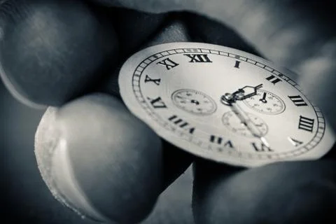 Clock in hand Stock Photos