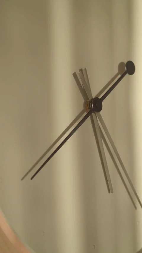 Clock hands and shadows create simple design at home Stock Footage 328780672