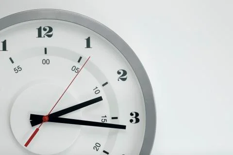 Clock hands on white Stock Photos