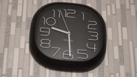 The clock is hanging on the wall Stock Footage 162627270