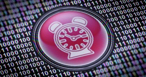 Clock icon. Binary code ( array of bits ) in the screen. Looping footage Video stock 111146872