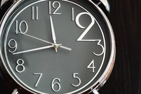 Clock isolated on black background Stock Photos