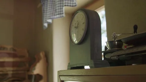 Clock in the kitchen on the counter Видео 76557285