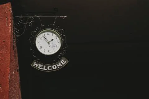 Clock with label Welcome Stock Photos