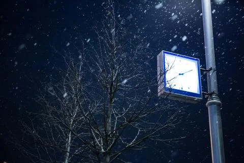 Clock on a lamppost. Moscow in winter Stock Photos