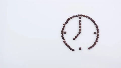 Clock made from coffee beans Stockbeeldmateriaal 184469516