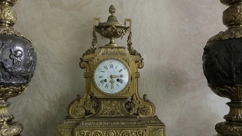 Clock on mantelpiece Stock Footage 77047984