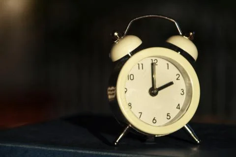 Clock marking winter time change Stock Photos