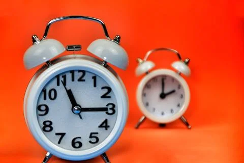 Clock marking winter time change Stock Photos