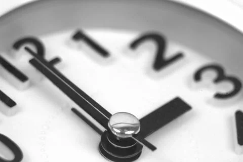 Clock marking winter time change Stock Photos