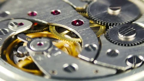 Clock mechanism. Very shallow depth of field. Focus on the central gears Stock Footage 83241706