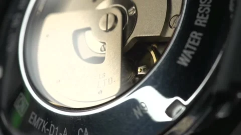 Clock mechanism working on dark background, macro 動画素材 144027359