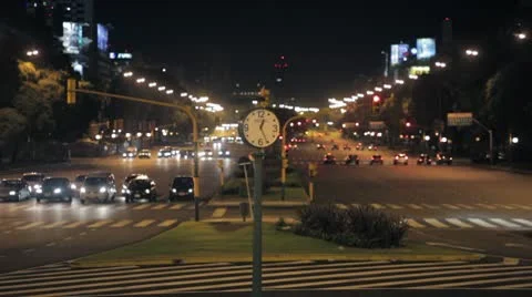 Clock in the middle of the street *Night* Stock Footage 8969030
