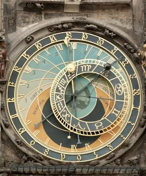 Clock on the old living surface in prague Stock Photos