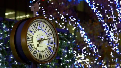 Clock over illuminated city Stock Footage 70195545