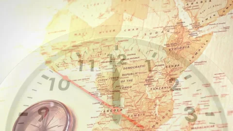 Clock overlay fading in starting hands ticking over Africa map and compass 库存影片 314530680