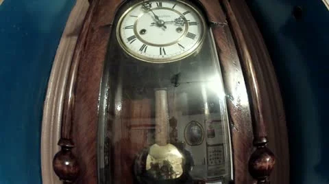 Clock with a pendulum Stock Footage 21046214