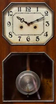 Clock with pendulum Stock Photos