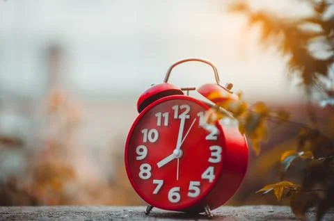Clock placed on the table. Фото