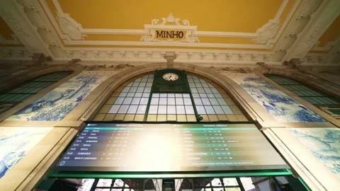 Clock at Porto main train station San Bentro Portugal. tourist destination Stock Footage 224760813