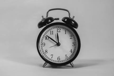 The clock reads 12 o'clock; its time for lunch. Foto stock