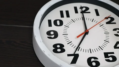 The Clock With The Red Arrow Shows The Time Seven Hours. Vídeos de archivo 107800125