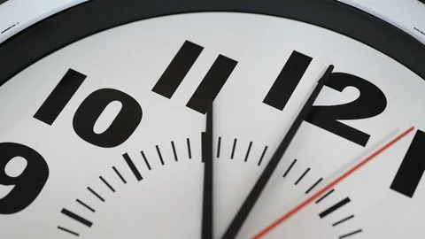 The Clock With The Red Arrow Shows The Time Eleven Hours. 스톡 동영상 107800458