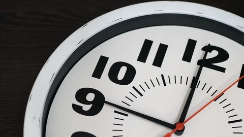 The Clock With The Red Arrow Shows The Time Nine Hours. Vídeo Stock 107800504