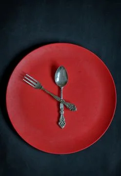 Clock with red plate, spoon and fork Free Stock Photos