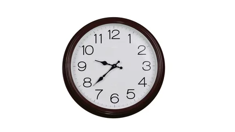 A clock with a round dial on a white background. Time concept. The hands make Stock Footage 94801624