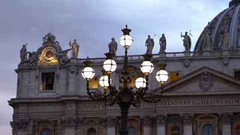Clock on Saint Peter Basilica at night. Vatican city, Rome, Italy. Tourism  Stock Footage 125884803