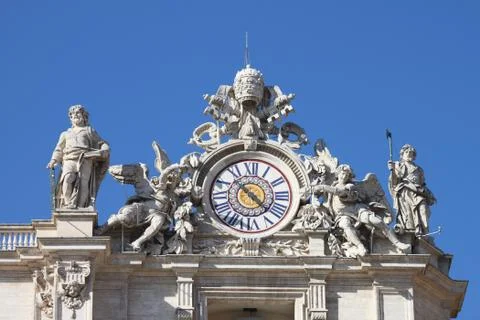 Clock of Saint Peter basilica Stock Photos