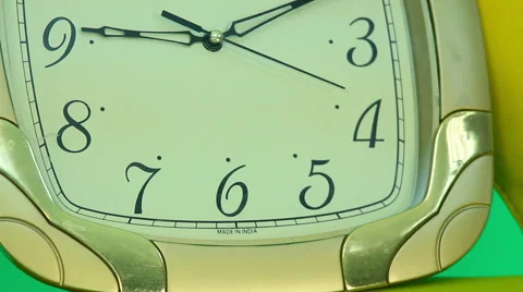The clock seconds hand on a green background Stock Footage 60744981