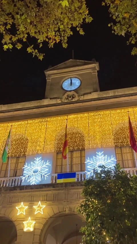 Clock showing new year coming on Nueva Square in Sevilla, Spain Stock Footage 233641879