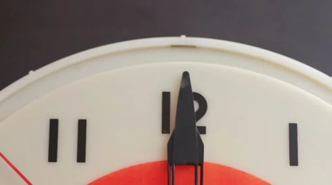 Clock showing noon with red second hand Stock Footage 67633239