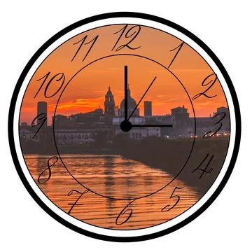 Clock showing three o'clock with sunset landscape. Stock Photos