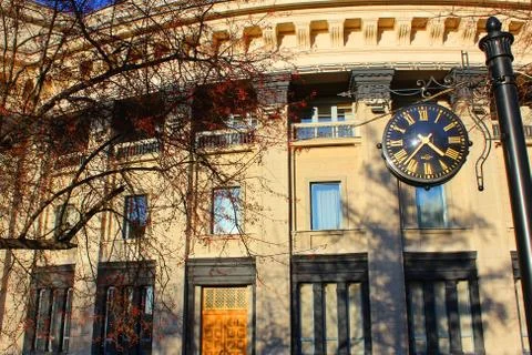 A clock on the side of a building Stock Photos