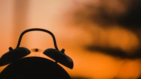 Clock Silhouetted on a Sunset Stock Footage 91552673