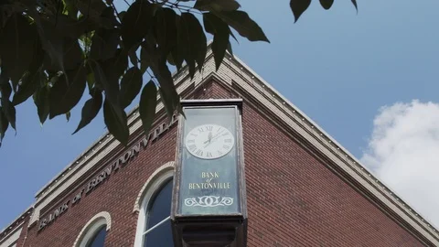 A Clock Sits Outside A Bank In A Small Town Stock Footage 87399534