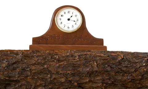 Clock sits on top of a mantle Stock Photos