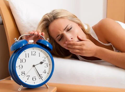 Clock with sleep at night. Stock Photos