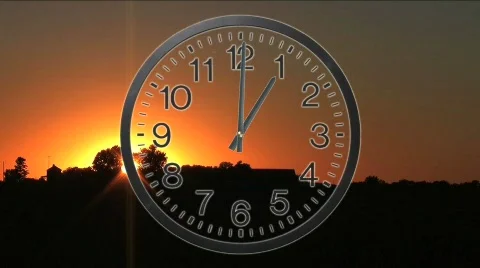 Clock With Sunset Time Lapse 動画素材 597458