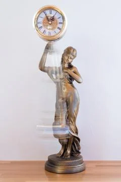 Clock with Swinging Pendulum Stock Photos
