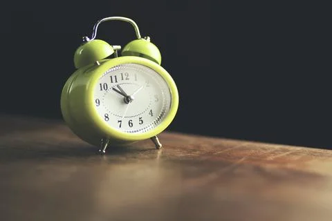 Clock on table 스톡 사진