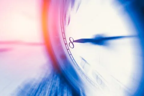 Clock time with zoom motion blur focus at 8 o'clock, fast speed business ho.. Stock Photos
