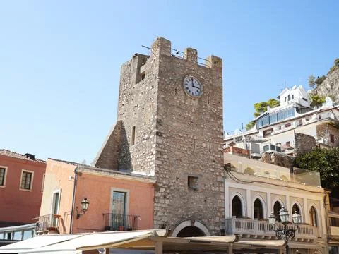 The Clock Tower on 9th of April Square in Taormina, Sicily Stock Photos