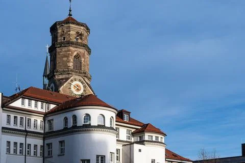 Clock tower above white building under clear blue sky 스톡 사진