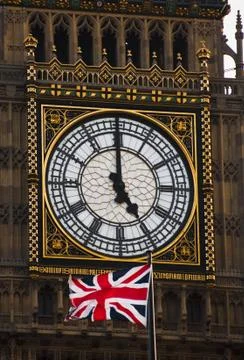 The Clock Tower and the British flag Stock Photos