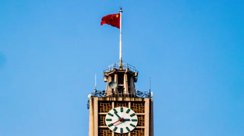 The clock tower and the flag in Beijing, China Video stock 32522688