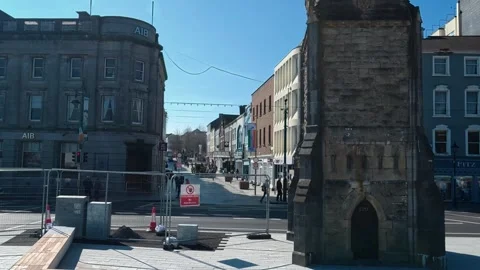 Clock tower and street view of Quays in Waterford City Ireland early summer Stock Footage 333395563